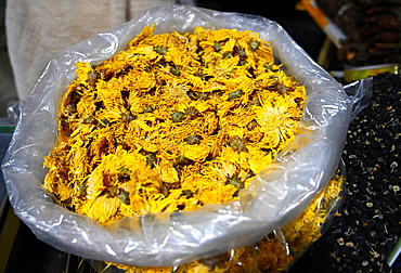 Partially dried chrysanthemum flower heads for tea, for sale in Shazhou market, Dunhuang, China, Asia