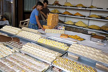 Boys working in a Diwali sweet (metai) shop, Jaipur, Rajasthan, India, Asia