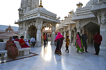 Visitors to the white marble Swaminarayan temple, built following the 2001 earthquake, Bhuj, Gujarat, India, Asia