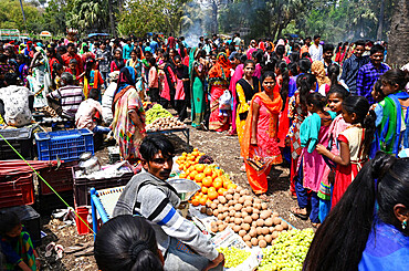 Adivasi villagers at traditional rural village fair celebrating Holi festival, Gujarat, India, Asia