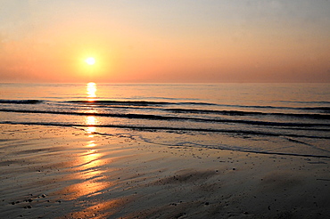 Sunrise over calm sea on the east coast of England, Walberswick, Suffolk, England, United Kingdom, Europe