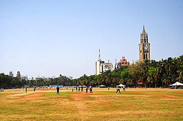 At least five cricket matches being played on the Azad Maidan, formerly known as Bombay Gymkhana Maidan in the city centre, Mumbai, India, Asia