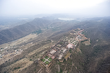 Amber Fort in Aravali hills, seen from the air, looking towards Jaipur in the distance, Rajasthan, India, Asia