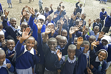 School children waving, Langalanga Primary School, Gilgil district, Rift Valley, Kenya, East Africa, Africa