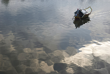 Sampan ferry on the Sarawak River in the centre of Kuching city in Sarawak, Malaysian Borneo.