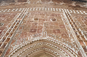 Carved terracotta work above arched doorway in the Lalji Mandir, one of the terracotta temples at Kalna, West Bengal, India, Asia