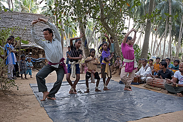 A demonstration of traditional Gotipua (single boy) temple dancing taking place in musician's village, Ballia, Orissa, India, Asia