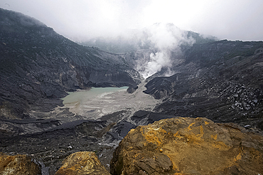 Hot volcanic steam rising into monsoon clouds from Kawah Ratu (Queen's Crater) of Mount Tangkuban, Perahu, Bandung,  Java, Indonesia, Southeast Asia, Asia