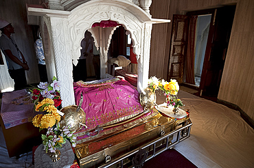 Guru Granth Sahib, the Sikh holy book, covered, in the Darbar Sahib at the Gurudwara Sri Guru Tegh Bahadur Sahib Sikh temple, Dhubri, Assam, India, Asia