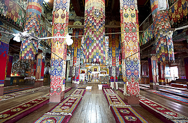 Prayer hall in Tawang Buddhist monastery, the largest in India, with pillars covered in prayer flags, Tawang, Arunachal Pradesh, India, Asia