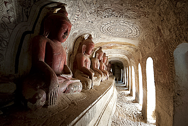 Buddha statues in one of the 947 Hpowindaung sandstone caves, 18th century paintings on the walls, Monywa, Sagaing District, Myanmar (Burma), Asia