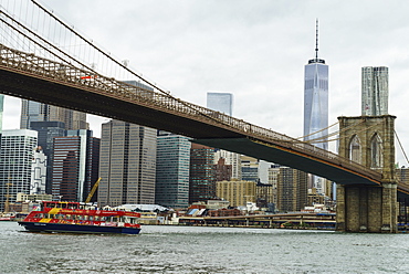 Brooklyn Bridge and Lower Manhattan skyline at sunset, New York City, New York, United States of America, North America