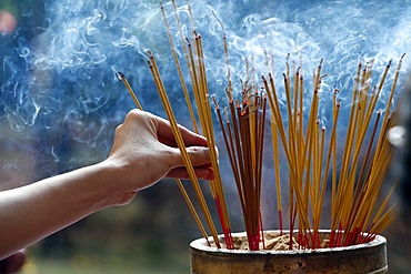 Emperor Jade pagoda (Chua Phuoc Hai), incense sticks on joss stick pot burning, smoke used to pay respect to the Buddha, Ho Chi Minh City, Vietnam, Indochina, Southeast Asia, Asia