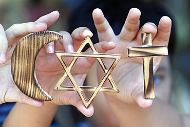 Christianity, Islam, Judaism, the three monotheistic religions with symbols of Jewish Star, Muslim Crescent and Christian Cross, Vietnam, Indochina, Southeast Asia, Asia