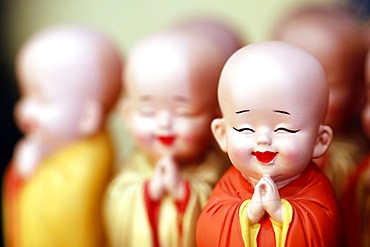 Buddhist monk figurines, Ho Chi Minh City, Vietnam, Indochina, Southeast Asia, Asia