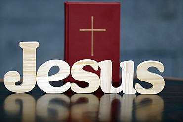 Wooden letters forming the word JESUS and Bible, Christian symbol, Vietnam, Indochina, Southeast Asia, Asia