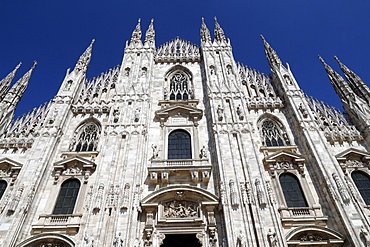 The west facade of the Duomo, the Gothic style cathedral dedicated to St. Mary, Milan, Lombardy, Italy, Europe