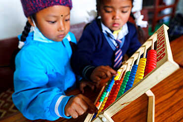 Primary school, students learning to count on an abacus, Charikot, Dolakha, Nepal, Asia