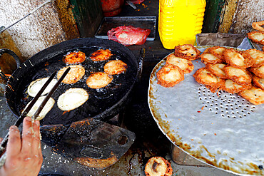 Traditional Nepalese restaurant, fried Sel Roti, the traditional breakfast for Nepali people, Kathmandu, Nepal, Asia