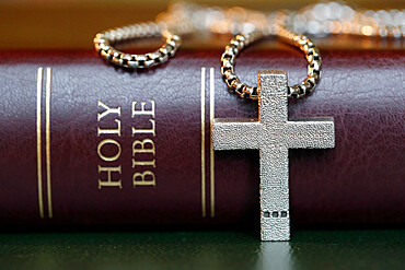 Holy Bible book with a Christian cross, symbol of Christianity, Yonne, France, Europe