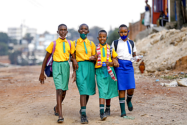 Children walking from school in Kigali, Rwanda, Africa