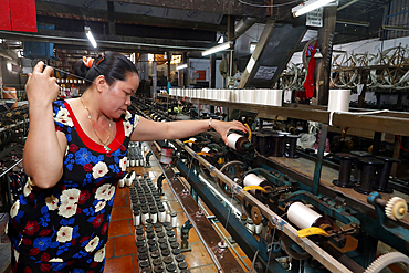 Woman working in a traditional silk factory, Tan Chau, Vietnam, Indochina, Southeast Asia, Asia