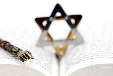 Close-up detail of a Torah in Hebrew, Star of David and a yad, Jewish symbols, France, Europe