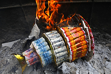 Mieu Ba Chua Xu temple (Temple of the Goddess Xu), burning joss paper offerings, Chau Doc, Vietnam, Indochina, Southeast Asia, Asia