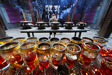 The Thien Hau Temple, the most famous Taoist temple in Cholon, red candles and incense sticks on joss stick pot burnt to pay respect to the Buddha, Ho Chi Minh City, Vietnam, Indochina, Southeast Asia, Asia Vietnam.