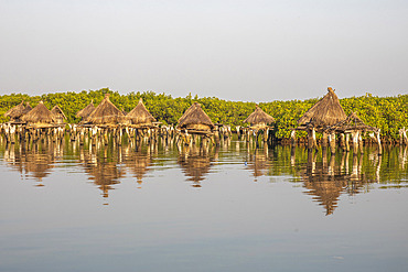 Ancient granaries on an island among mangrove trees, Joal-Fadiouth, Senegal, West Africa, Africa