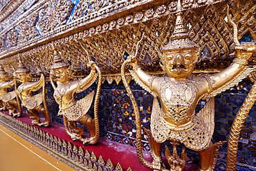 Golden sculptures of Garuda and Naga, Wat Phra Kaew (Temple of the Emerald Buddha), Bangkok, Thailand, Southeast Asia, Asia