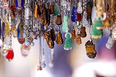 Buddhist pendants for sale in shop, Truc Lam Phung Hoang Zen Monastery, Dalat, Vietnam, Indochina, Southeast Asia, Asia