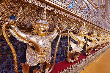 Golden sculptures of Garuda and Naga, Wat Phra Kaew (Temple of the Emerald Buddha), Bangkok, Thailand, Southeast Asia, Asia