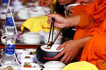 Vegetarian meal, monks at Buddhist ceremony in the main hall, Phuoc Hue Buddhist pagoda, Tan Chau, Vietnam, Indochina, Southeast Asia, Asia