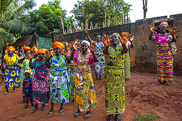 Women’s group waving goodbye in Dokoue, Benin