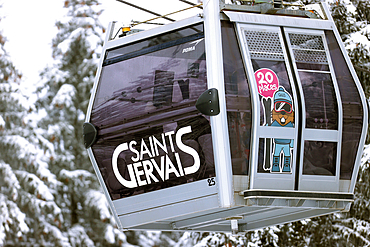 French Alps in winter, gondola lift at famous ski station, Saint Gervais Mont-Blanc village, Saint Gervais, Haute Savoie, France, Europe