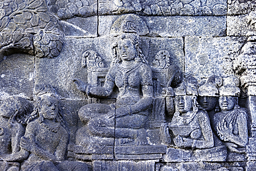 Borobudur, 9th-century Mahayana Buddhist temple. UNESCO World Heritage. Bas-relief dispicting the life of Buddha. Java. Indonesia.