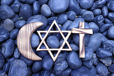 Christianity, Islam and Judaism : the three monotheistic religions. Jewish Star, Christian Cross and Muslim Crescent. Interreligious and interfaith dialogue.