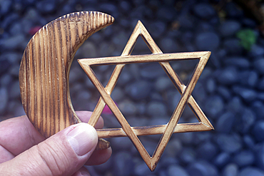 Islam and Judaism concept of interfaith dialogue, Jewish Star of David and Muslim Crescent, Indonesia