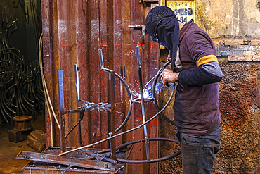 Craftsman at work in a workshop in Marrakesh, Morocco