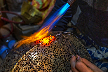 Craftsman at work in a workshop in Marrakesh, Morocco