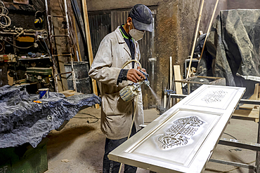 Craftsman at work in a workshop in Marrakesh, Morocco