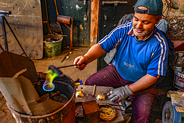 Craftsman at work in a workshop in Marrakesh, Morocco