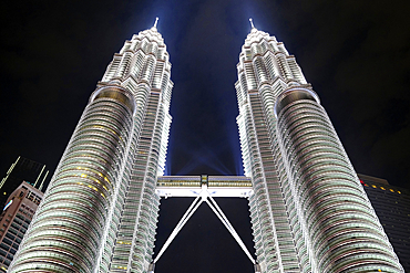 Petronas Twin Towers at night, the most famous twin skyscrapers in Kuala Lumpur. Malaysia, Asia.