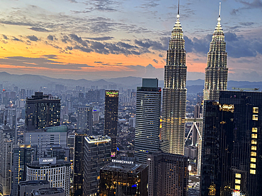 Petronas Twin Towers at night, the most famous twin skyscrapers in Kuala Lumpur. Malaysia, Asia.