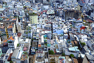 Ho Chi Minh city (or Saigon) skyline with colorful house. Saigon is the biggest city and economic center in the country. Vietnam.