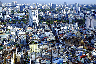 Ho Chi Minh city (or Saigon) skyline with colorful house. Saigon is the biggest city and economic center in the country. Vietnam.