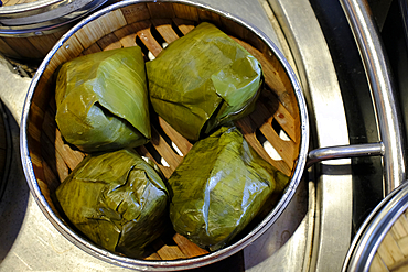 Dim sum and dumpling buffet in a restaurant. Steamer baskets.