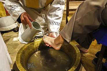 Maundy Thursday celebration in Saint Philippe du Roule catholic church, Paris, France. Foot washing ceremony