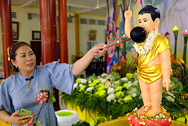 Thien Quang buddhist pagoda. Vesak celebration. Birthday of Shakyamuni Buddha. Bathing infant Buddha to Purify the heart. Tan Chau. Vietnam.